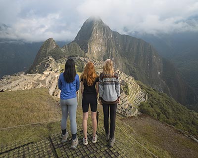3 tourists in Machu Pichu